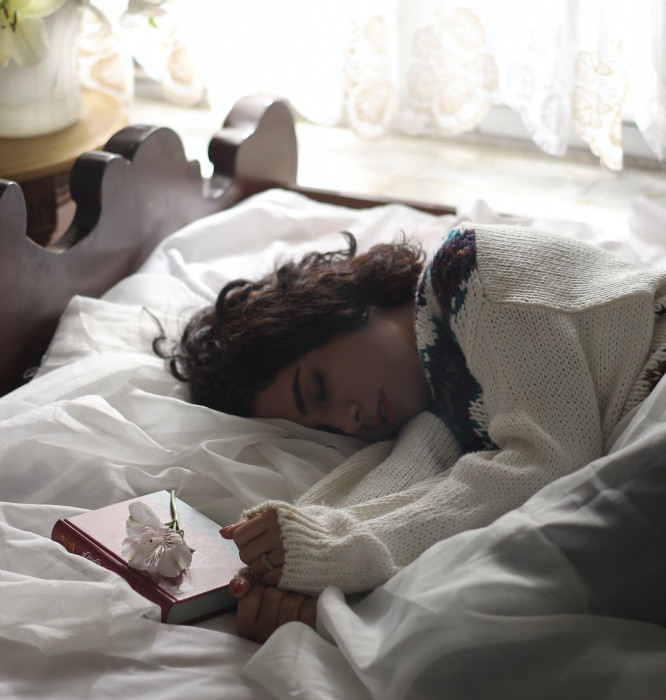 how to manifest anything you want in 24 hours: a woman is sleeping