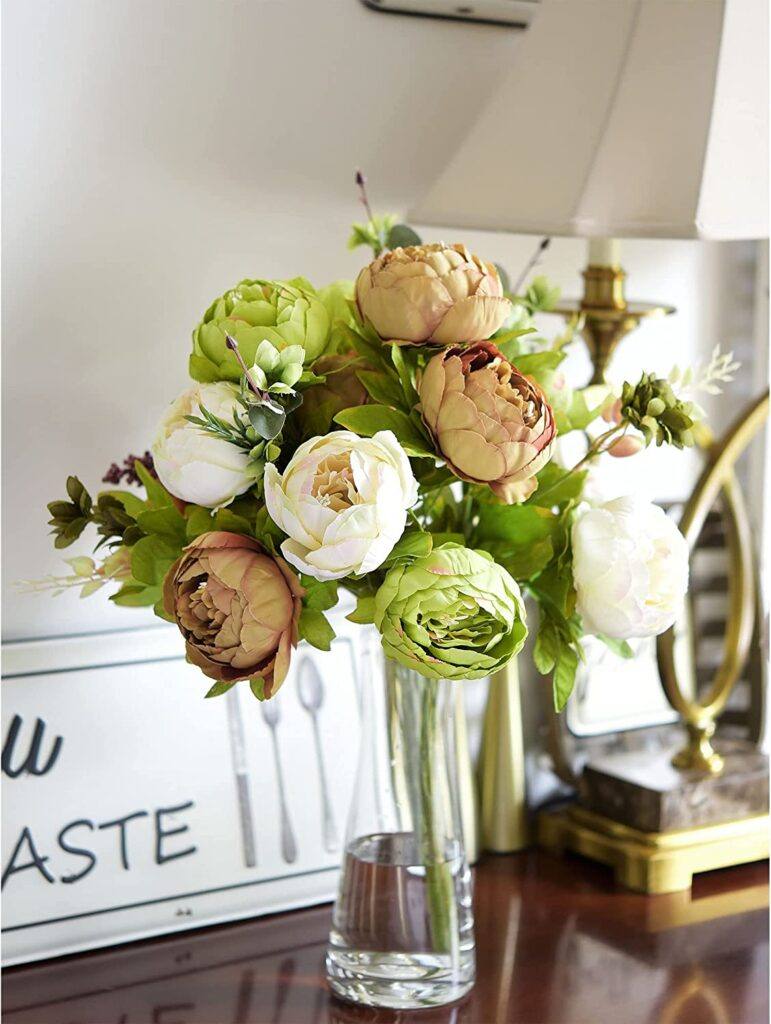 French country cottage decorating ideas: a glass vase with green flowers