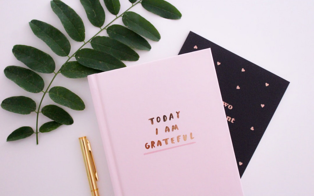 The key to contentment is gratitude - a notebook with a cover of " Today I am grateful"