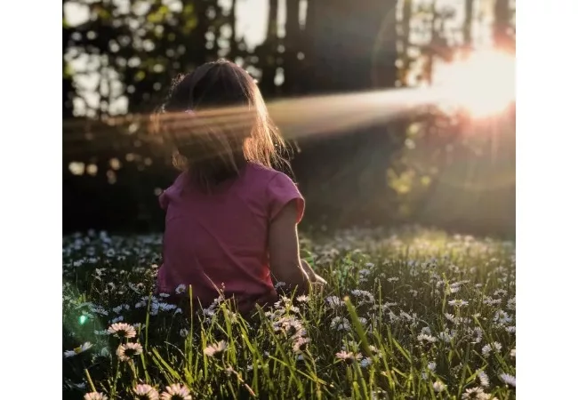 Healing your inner child exercises: a girl is enjoying the sunshine