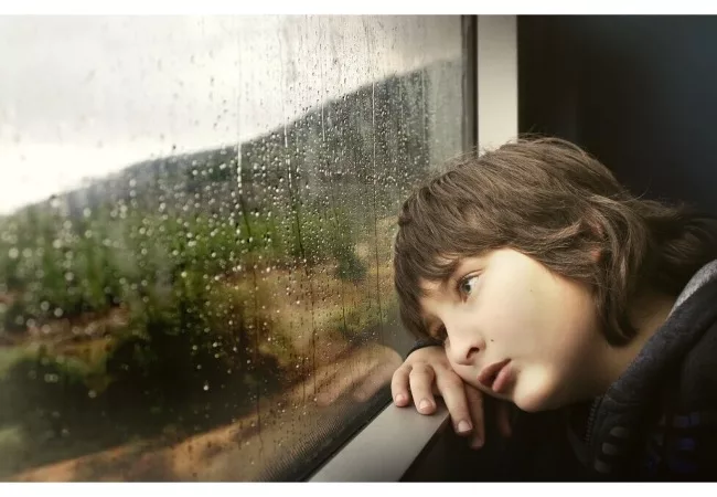 Healing your inner child exercises: a child by the window