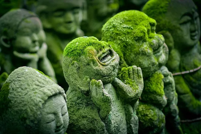 emotional detachment quotes: statue of Buddhist firgues