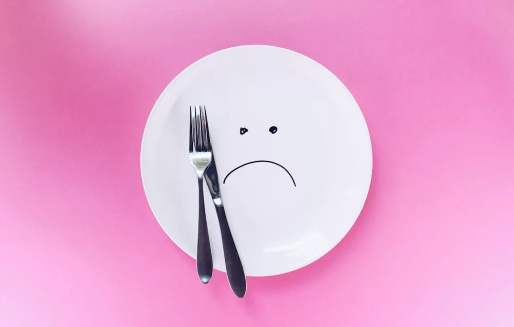 Law of Assumption Success Stories: a plate with a sad face