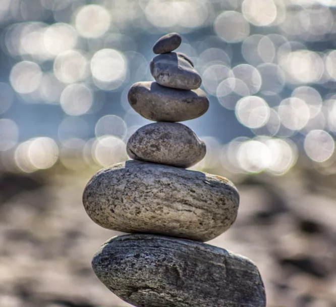 Emotional Detachment Quotes: stones stacking on each other