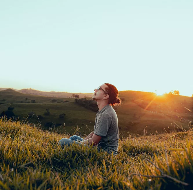 12 signs of spiritual awakening: a man is enjoying fresh air