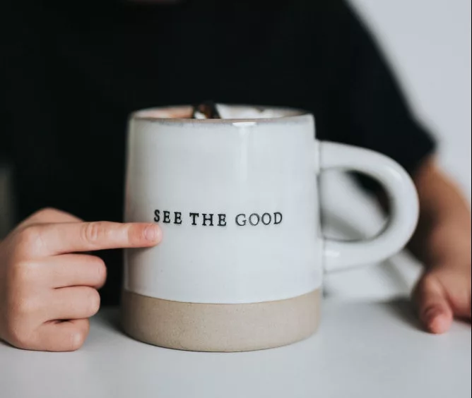 Law of Assumption Success Stories: the phrase " see the good" on a cup