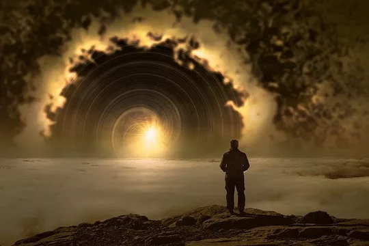 can dreams predict your future: a man standing in front of a source of light